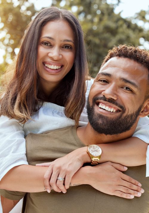 love-black-couple-with-smile-hug-bonding-happy-together-outdoor-fun-loving-embrace-portrait-romance-man-piggy-back-woman-with-happiness-marriage-relationship-celebrate.jpeg Love, black couple and with smile hug, bonding and happy together outdoor for fun, loving and embrace. Portrait, romance and man piggy back woman with happiness, marriage, relationship and celebrate